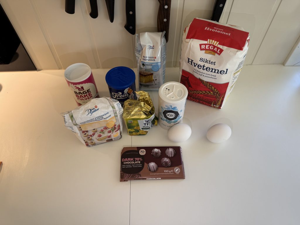 Baking powder, vanilla sugar, brown sugar, flour, sugar, butter, salt eggs and dark chocolate in their original packaging