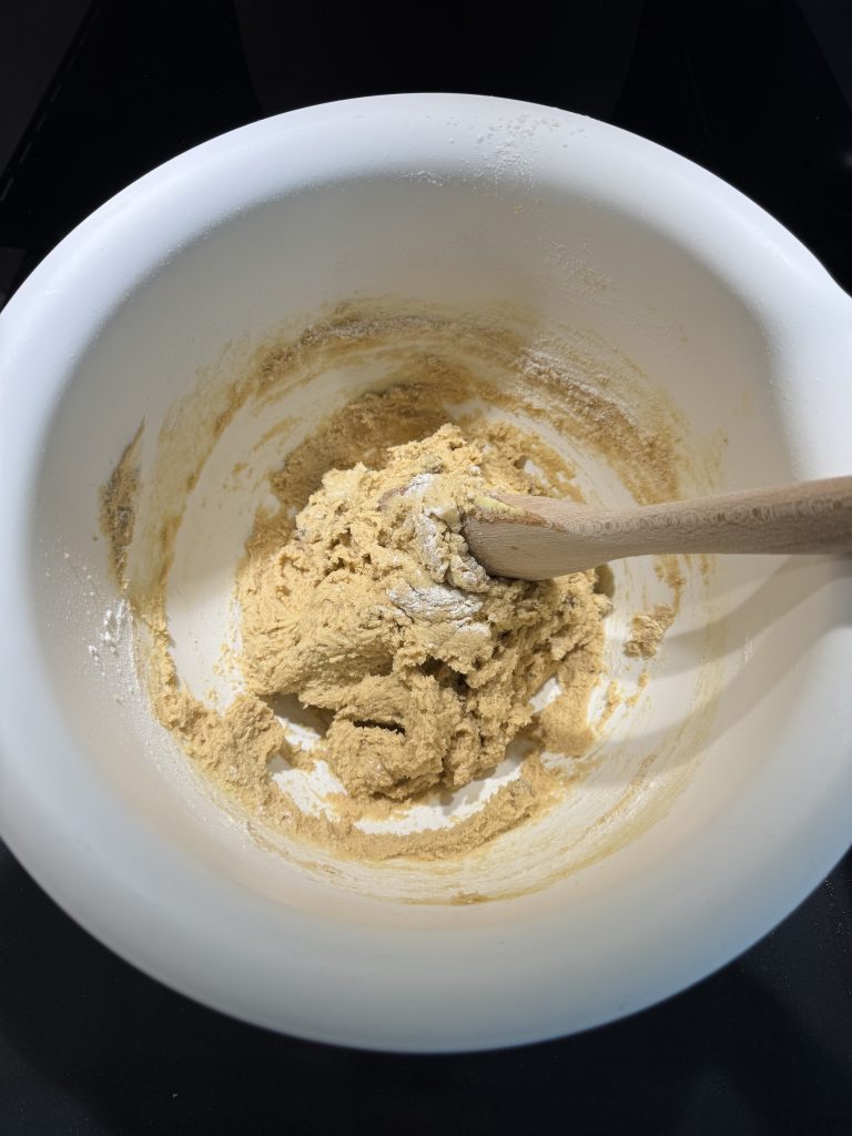 Raw cookie dough in a mixing bowl