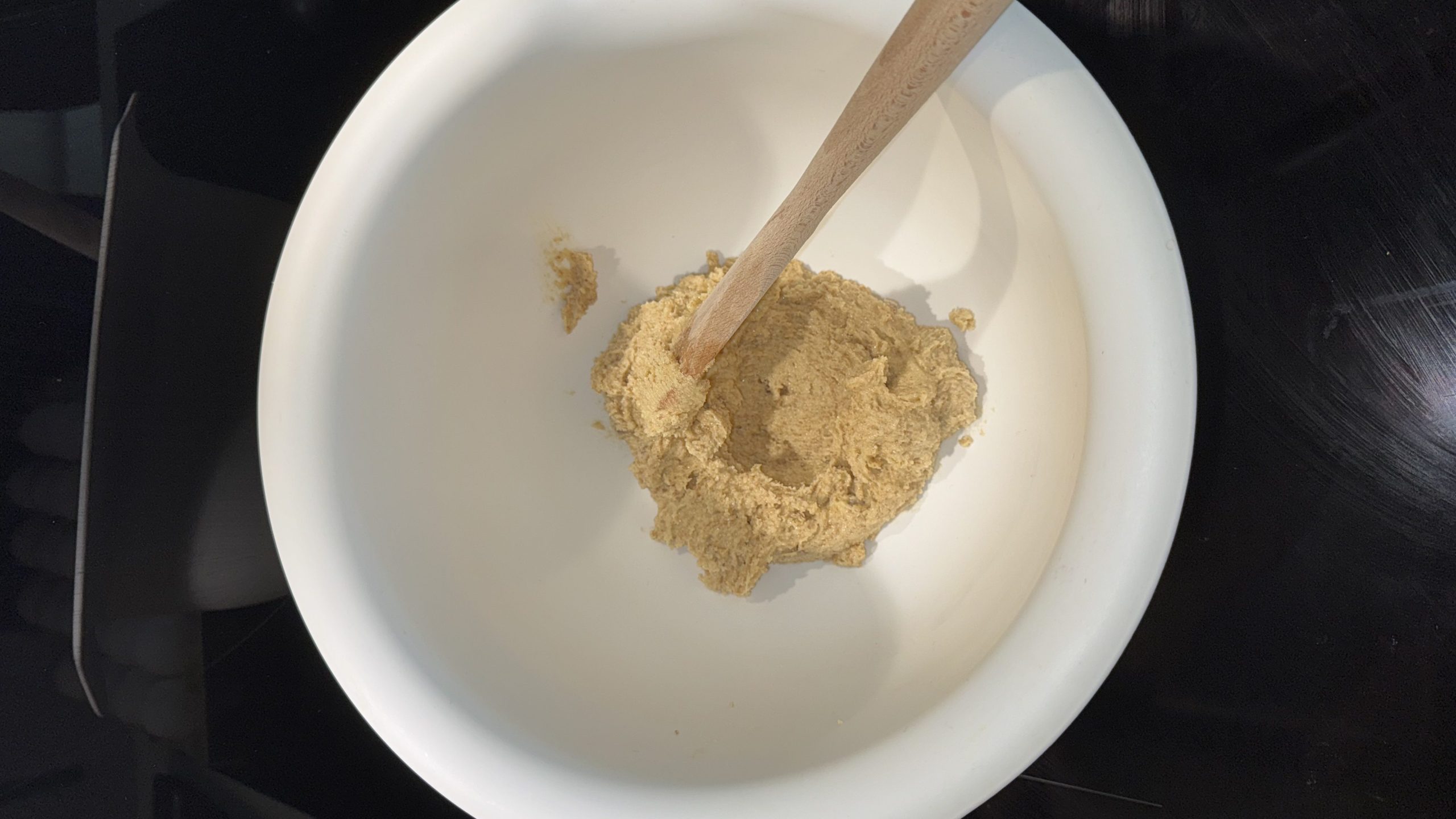 Sugar, brown sugar and butter mixed together in a bowl